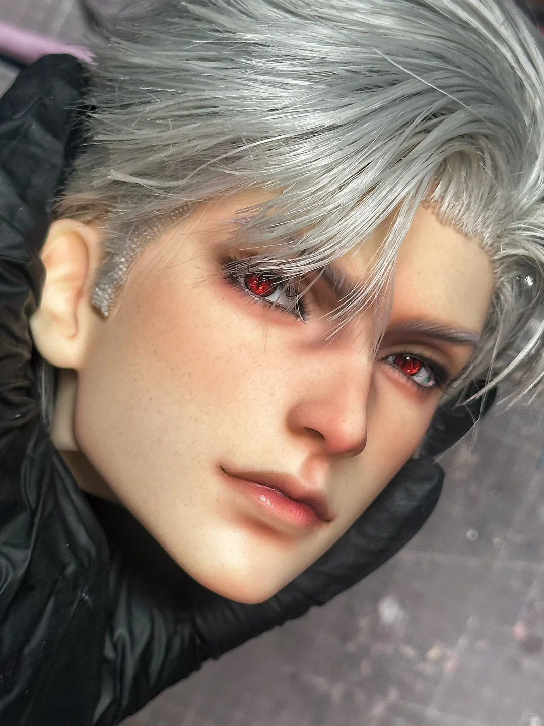 Finished fantasy BJD faceup with silver hair, red eyes, and painted details